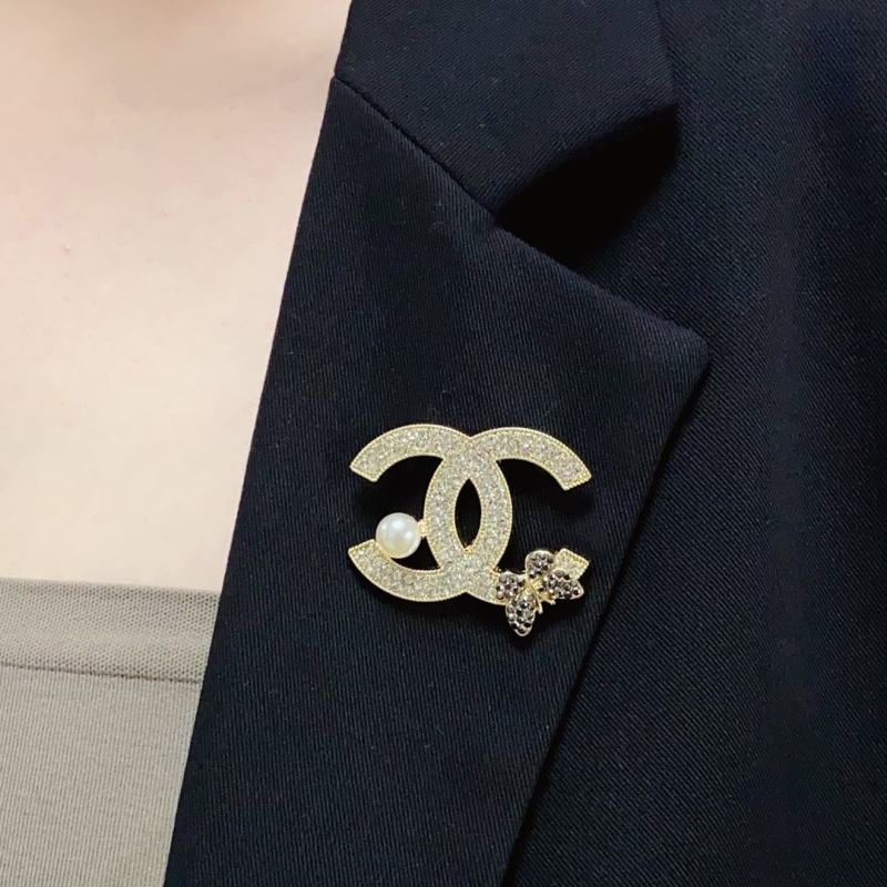 Ch**el brooches